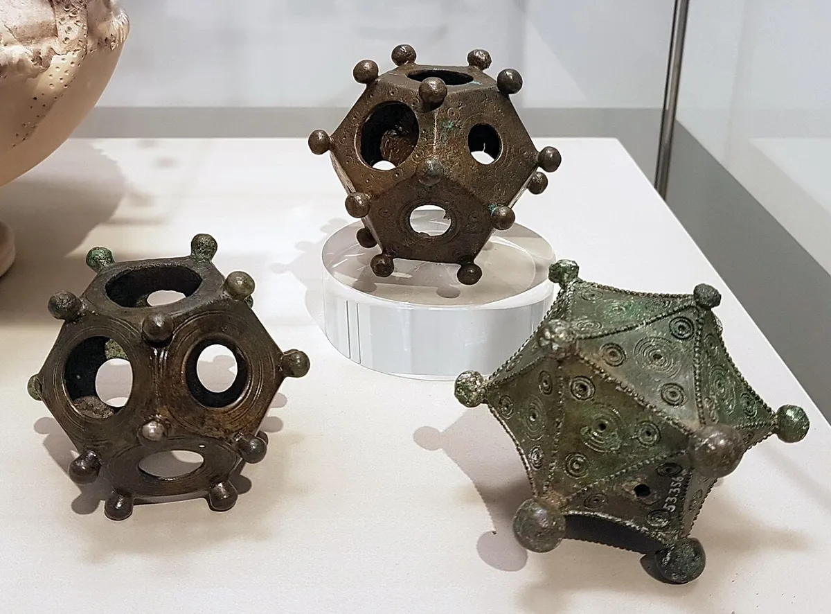 Two Roman dodecahedra and the Arloff icosahedron at the Rheinisches Landesmuseum Bonn