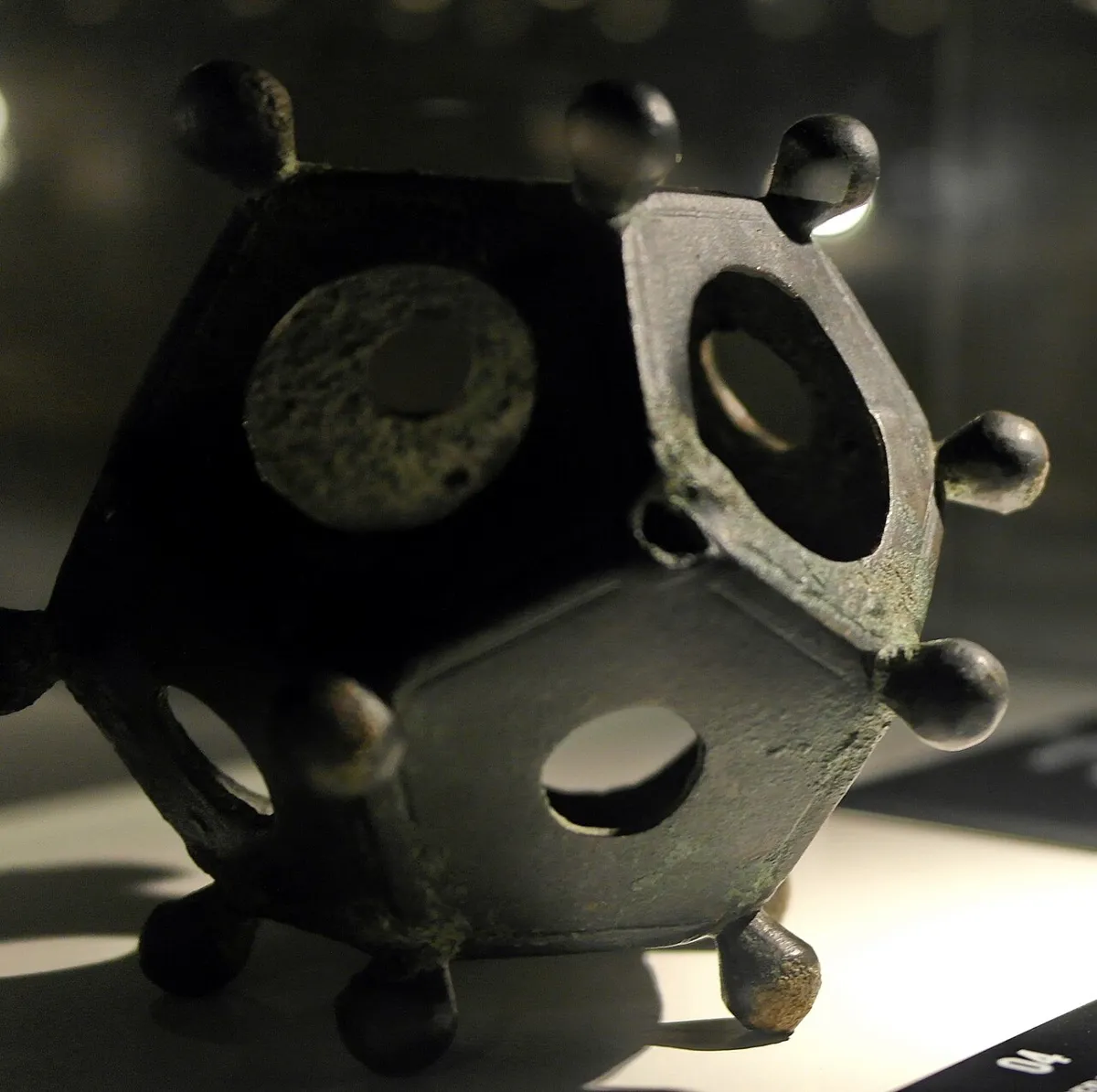 Close view of the Tongeren Roman dodecahedron showing different hole sizes