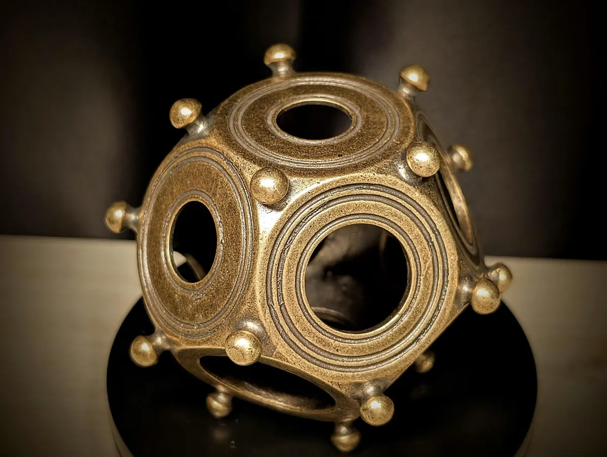 Solid metal dodecahedron replica, three-quarter view